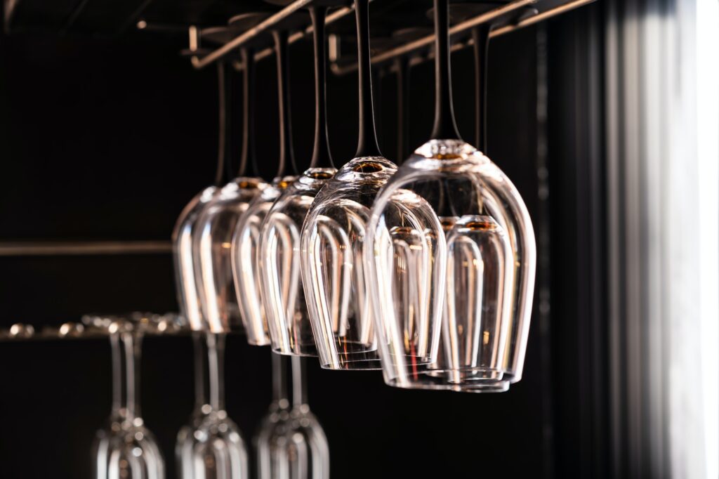 Wine glasses hanging above the bar in the restaurant